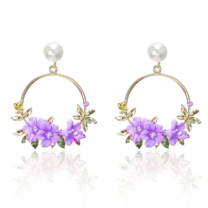 Flower and Pearl Earrings in Gold